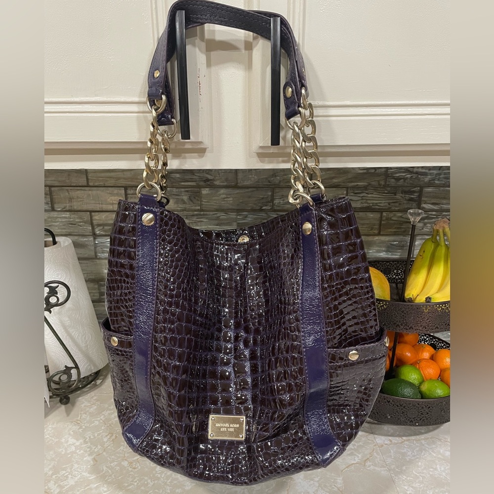 Unique purple Michael Kors bag.